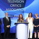 Leah Remini (center, at podium) and the Scientology And The Aftermath team accept the TCA Award for Outstanding Achievement in Reality Programming (Photo: Frederick M. Brown/Getty Images)